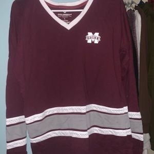 Brand colosseum. Size large. Color maroon